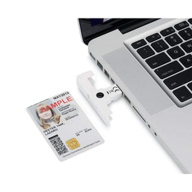 Identiv SCR3500 Smartfold reader in use with laptop, enabling secure card access.