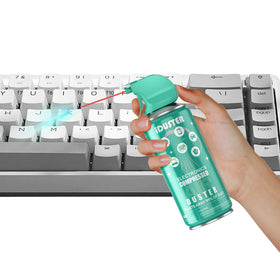 iDuster can in use blowing dust from keyboard to improve keystroke reliability