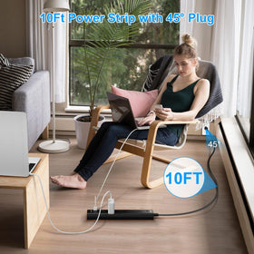 IECOPOWER power strip in a home office powering monitors and phone for tidy setup