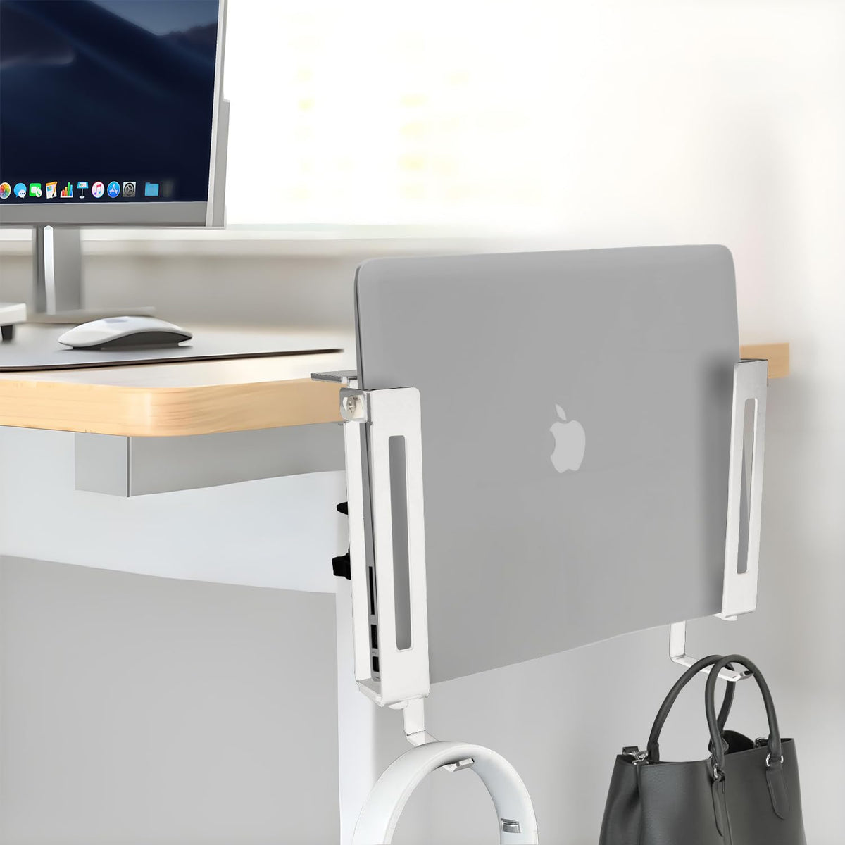 IFCASE space-saving desktop accessory frees area while keeping devices accessible.