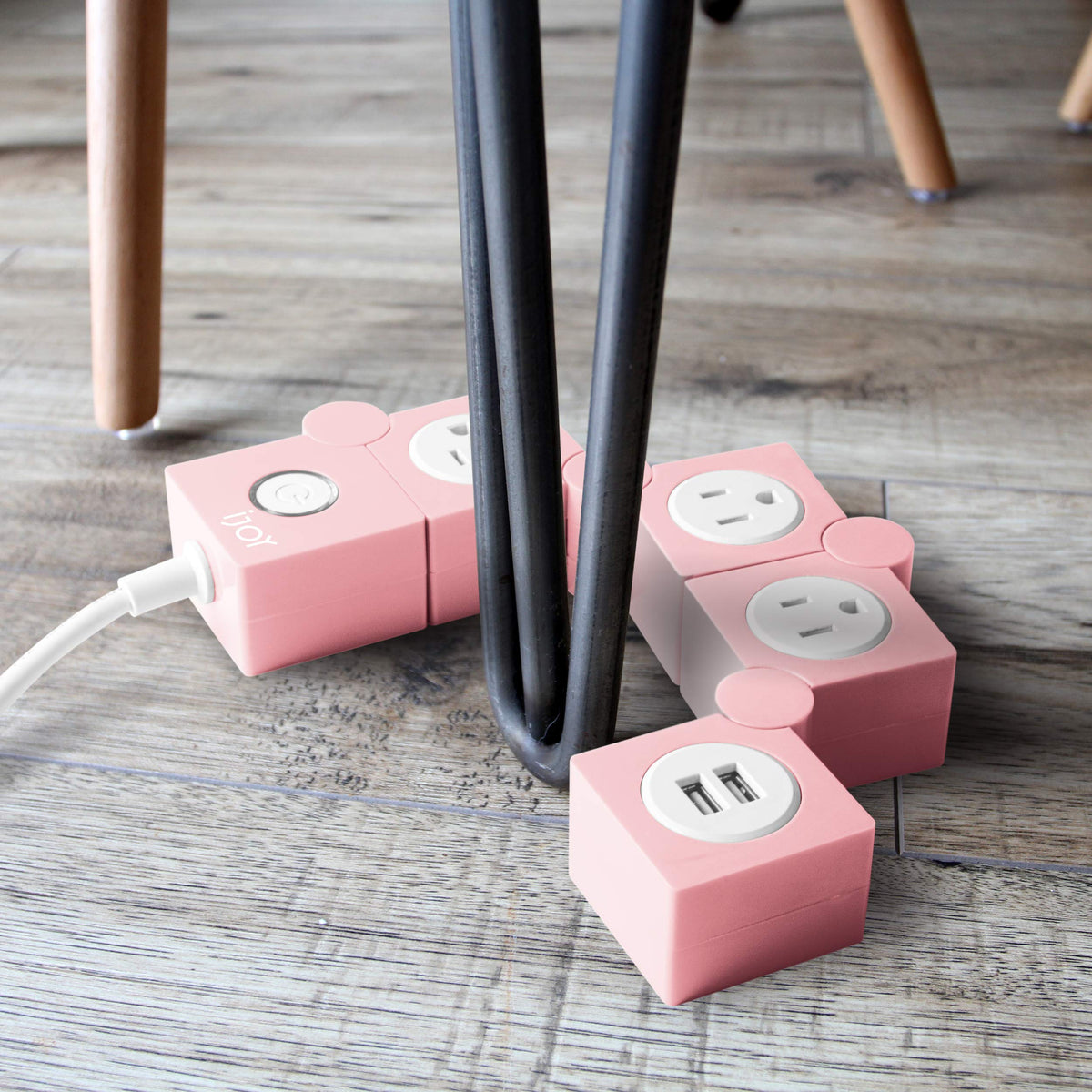 iJoy decorative surge protector suited for home, office, or travel spaces.