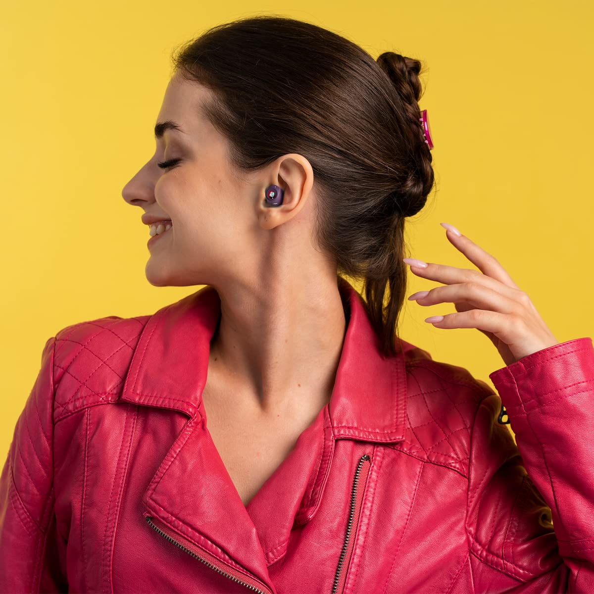 iJoy Disney Sally earbuds with water droplets illustrating IPX8 protection against sweat and light water
