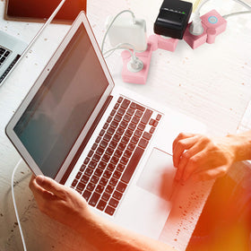 iJoy pink power strip blends with decor while keeping electronics organized.