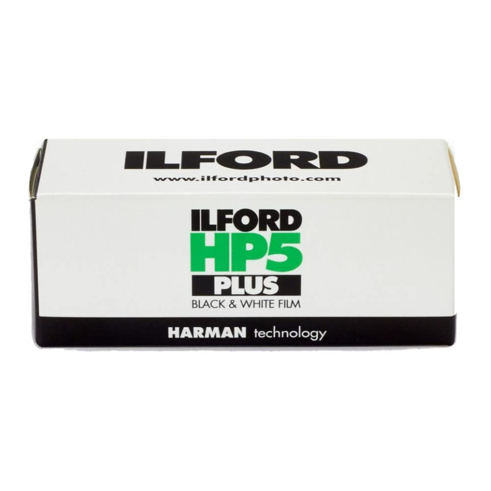 Ilford HP5 Plus 400 120 film roll closeup showing texture for street and available light.
