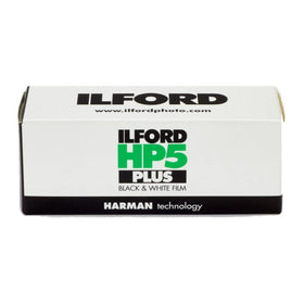 Ilford HP5 Plus 400 120 film roll closeup showing texture for street and available light.