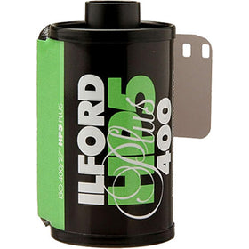 Ilford HP5 Plus 400 film canister closeup highlighting emulsion detail and handling