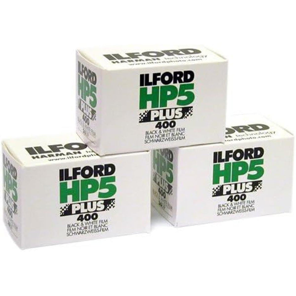 Ilford HP5 Plus 400 front packaging showing three 35mm rolls and benefits