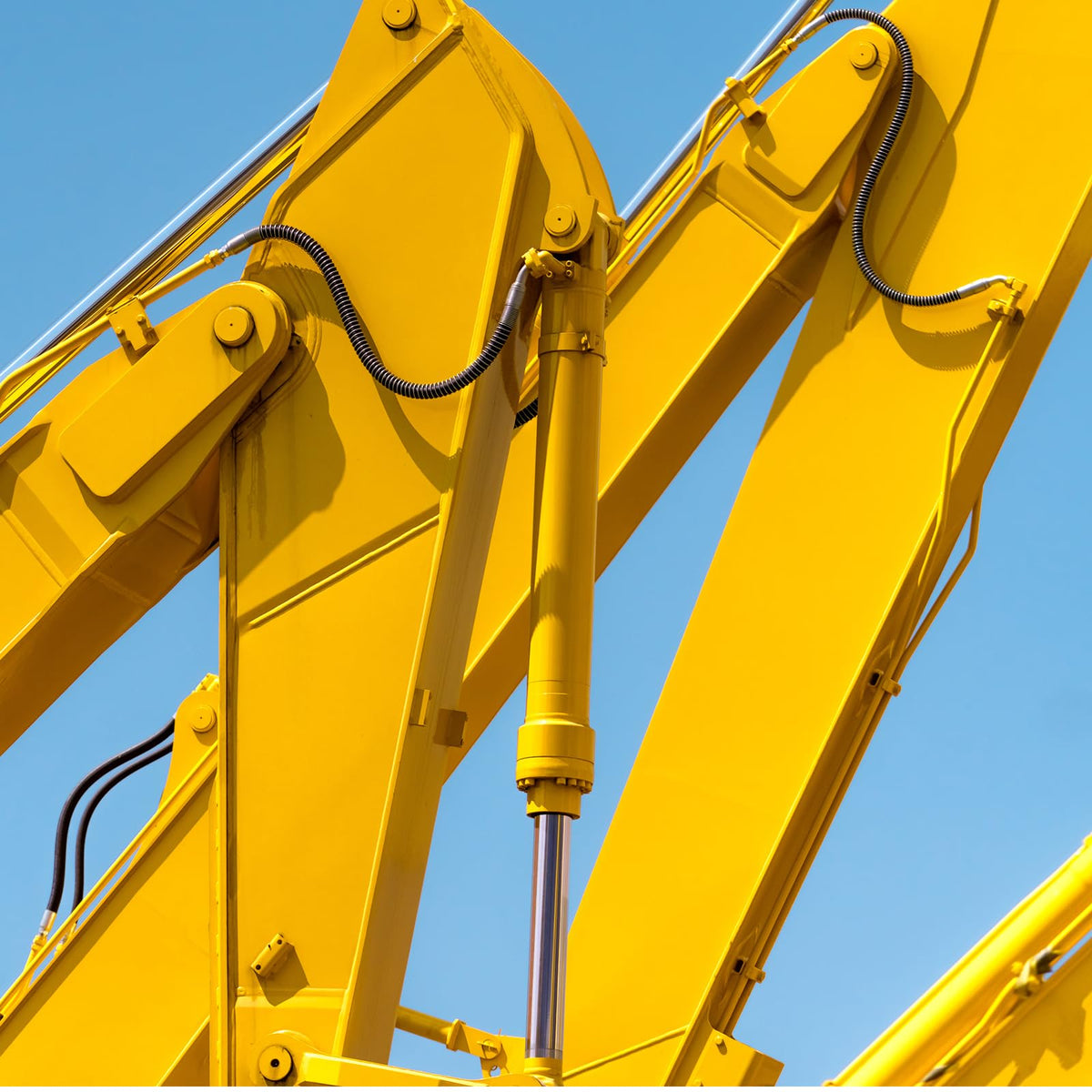 Innconee cable protector for hydraulic hoses minimizes abrasion in work environments.