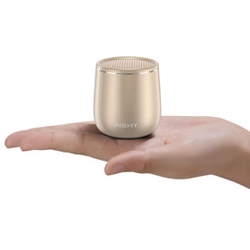 INSMY small Bluetooth speaker in gold, front view showing bold sound capability