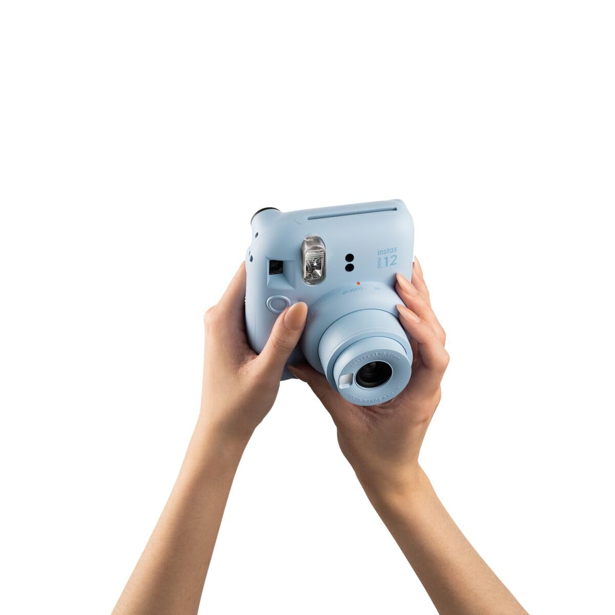 instax mini 12 pastel blue side view shows compact design.