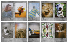 stone gray prints on tabletop with camera showing instax stylish keepsake display