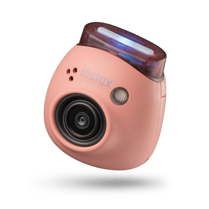 instax front view showing compact pink camera and portability benefit