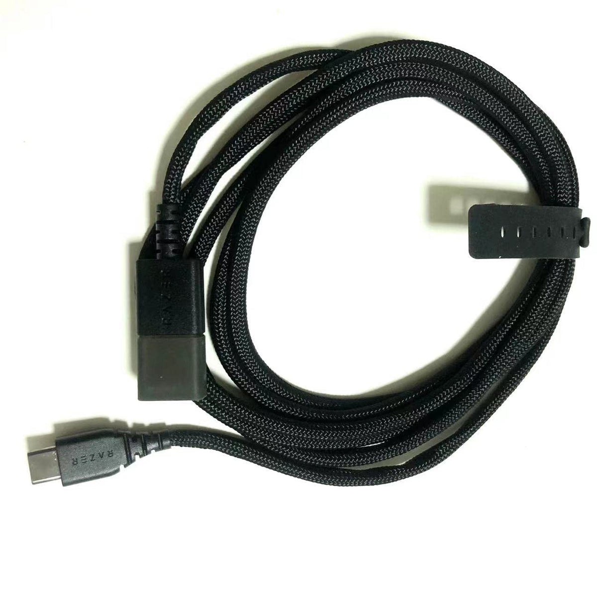 IRIDESCENT front view of black cable packaged, shows compatibility and length benefit