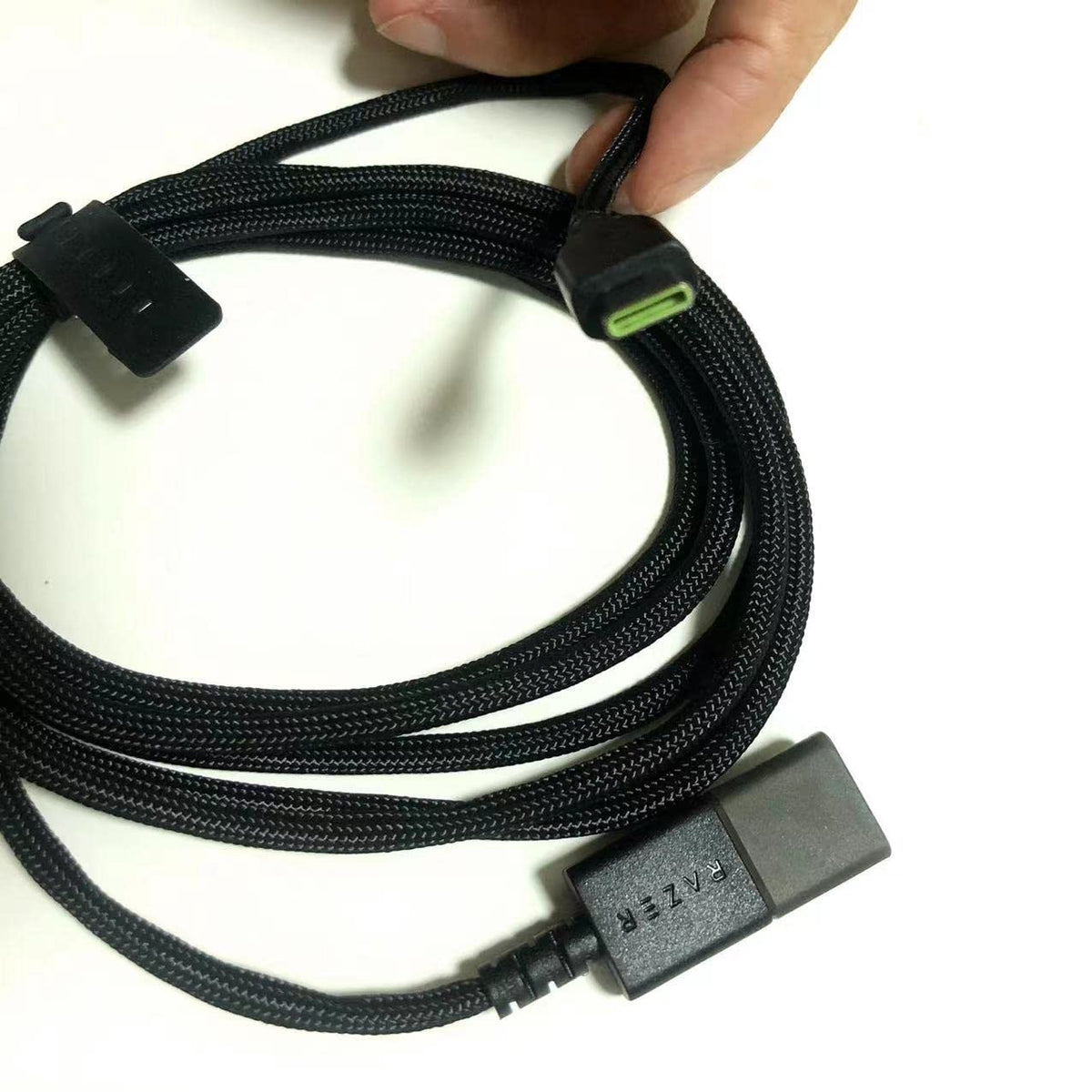 IRIDESCENT close-up of USB-C connector on cable showing secure fit and durability