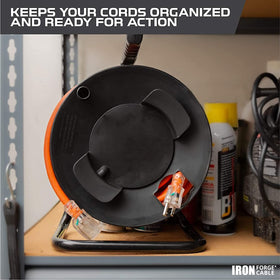 IRON FORGE CABLE reel in use on a workshop bench for neat, tangle-free cord management