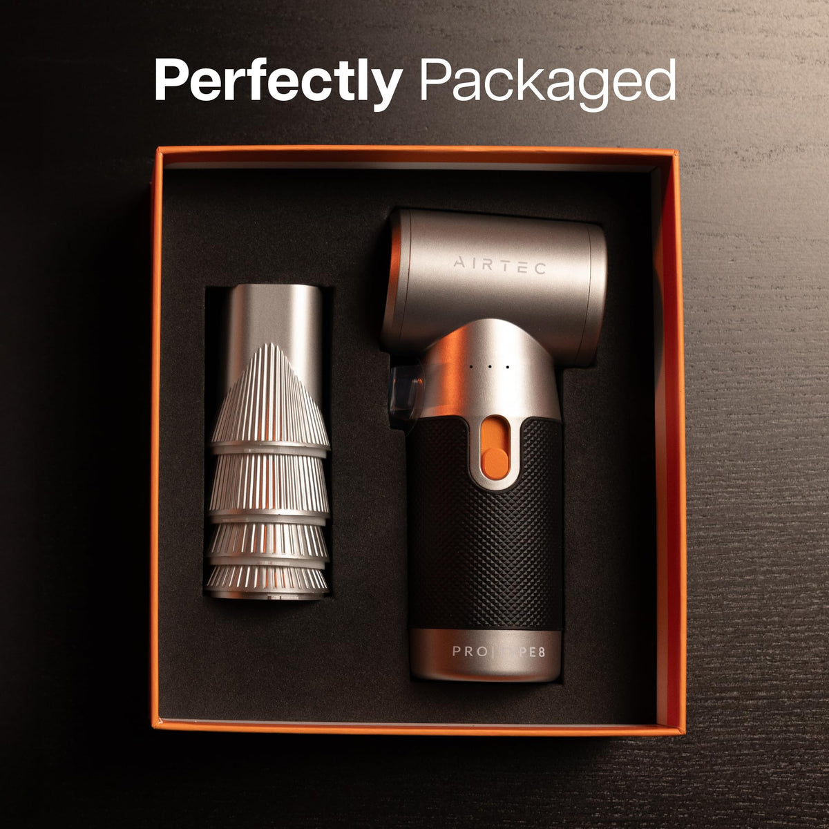 IT Dusters beside a hand to show size and portability for on‑the‑go use