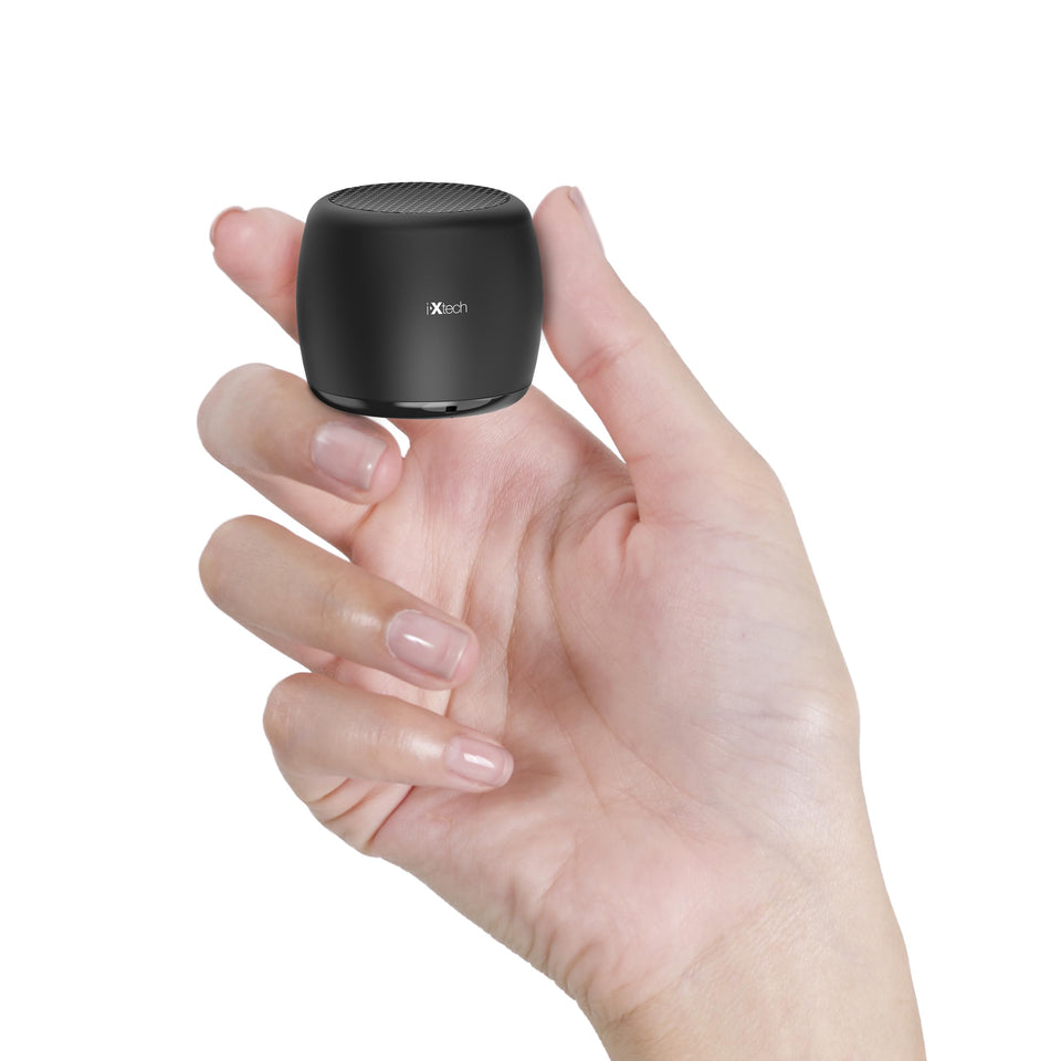 IXTECH portable Bluetooth speaker in compact carry design for easy travel.