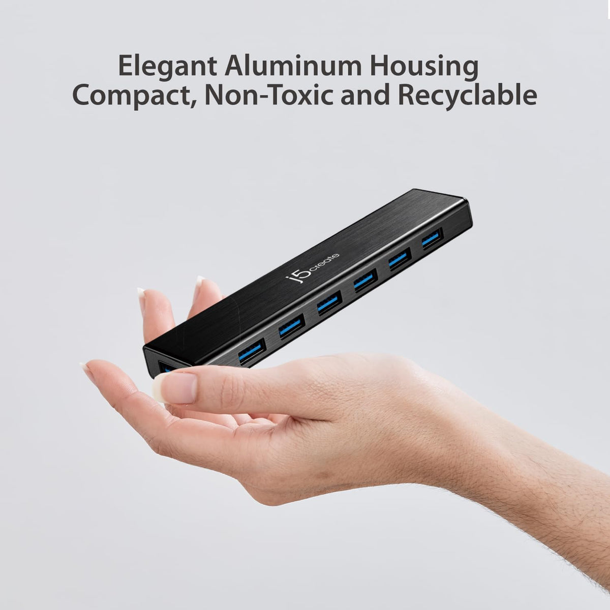 j5create hub next to ruler illustrating 3.3 ft cable length for flexible placement benefit