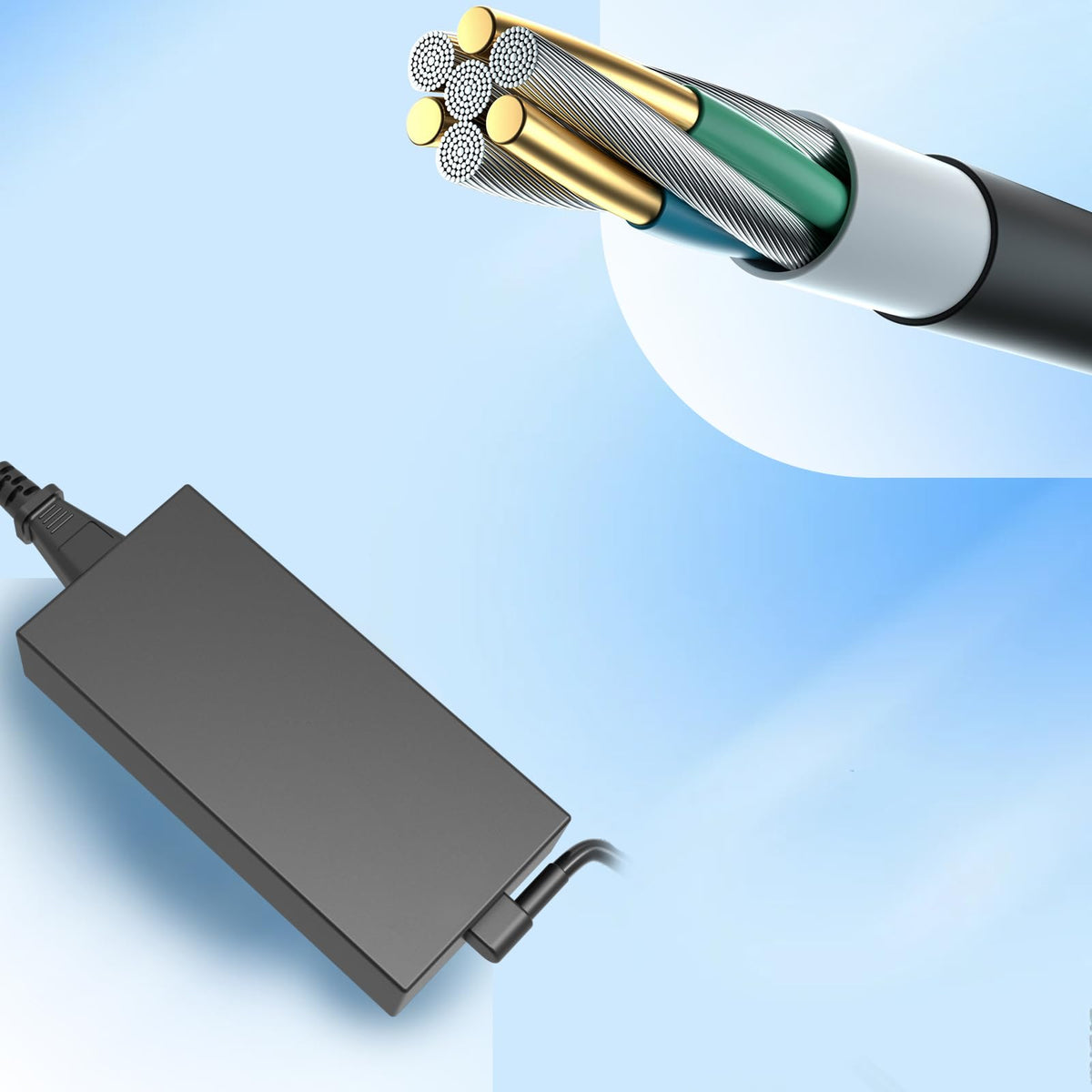 JAART adapter next to laptop to show size and portability benefit