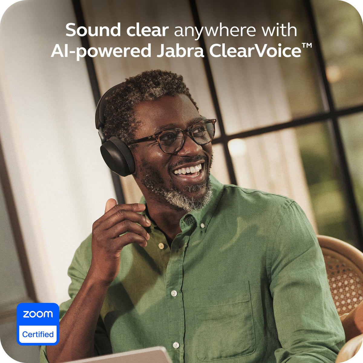 Jabra Evolve3 75 on-ear headset on desk during a call for focused productivity.