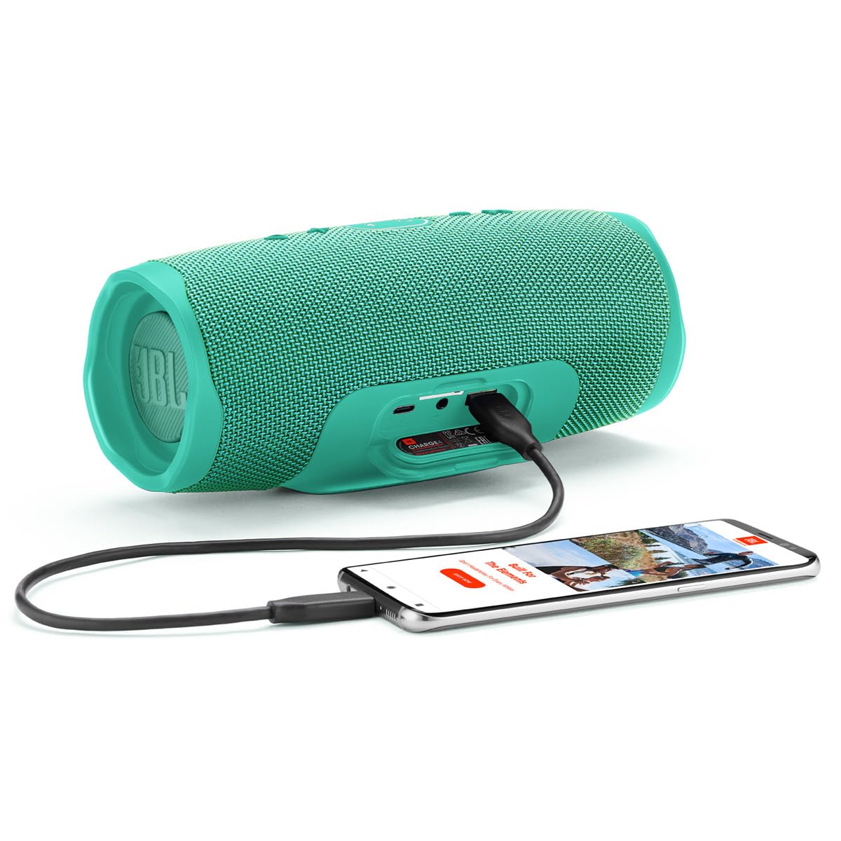 JBL Charge 4 teal beach scene delivering outdoor soundtrack by the water.