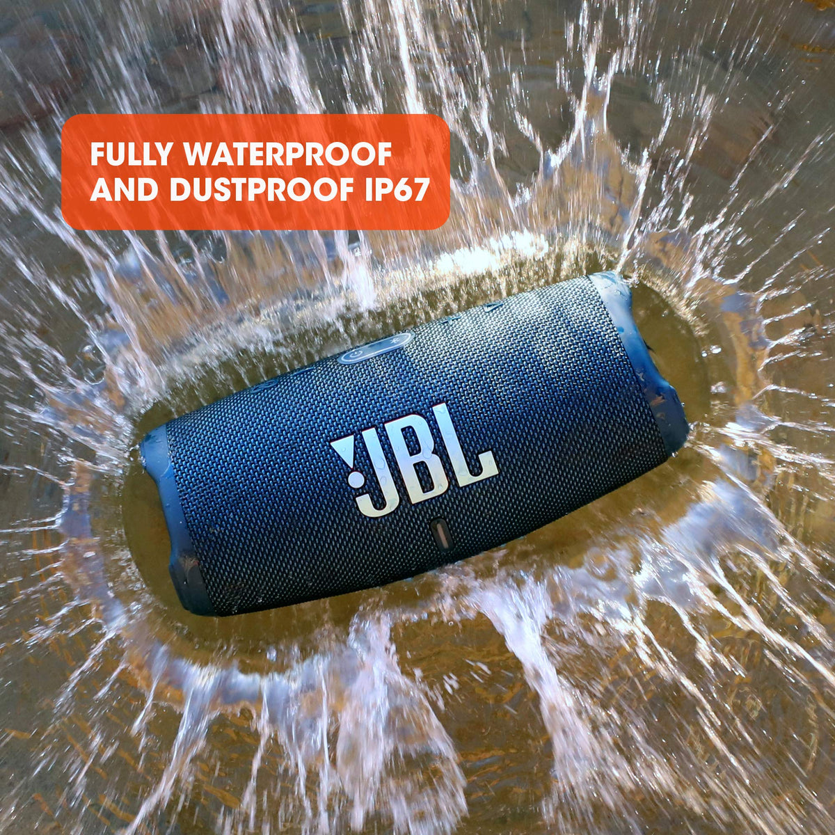 JBL Charge 5 red in-hand shot, ready for travel.