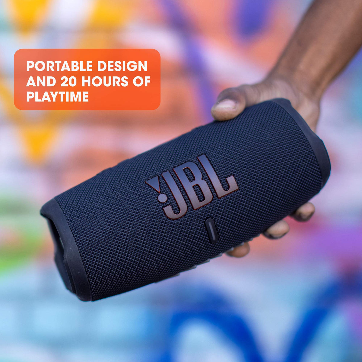 JBL Charge 5 red top angle, shows compact portability.