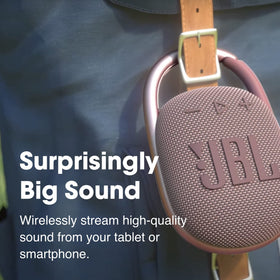 JBL Clip 4 Yellow carabiner attached to a bag for hands-free listening.