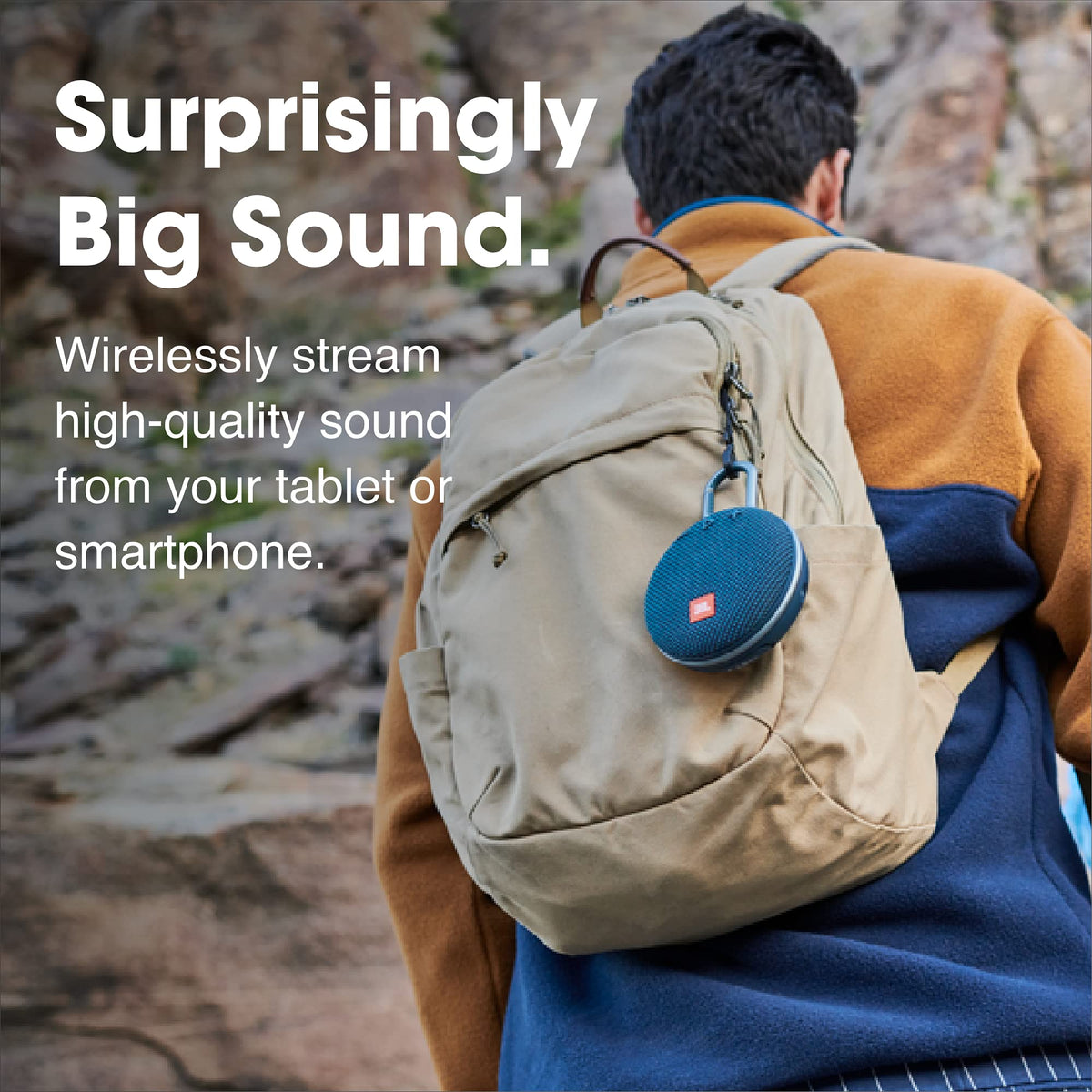 JBL Clip 3 integrated metal carabiner clipped to backpack, secure attachment benefit