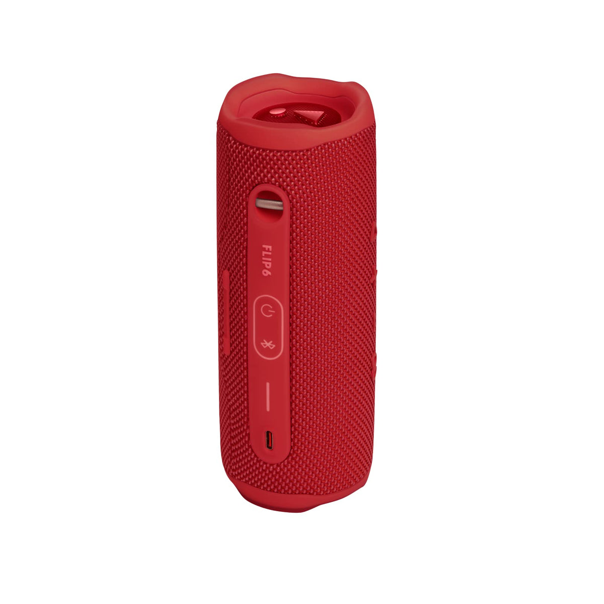 JBL Flip 6 in-use on the beach demonstrates vibrant color.