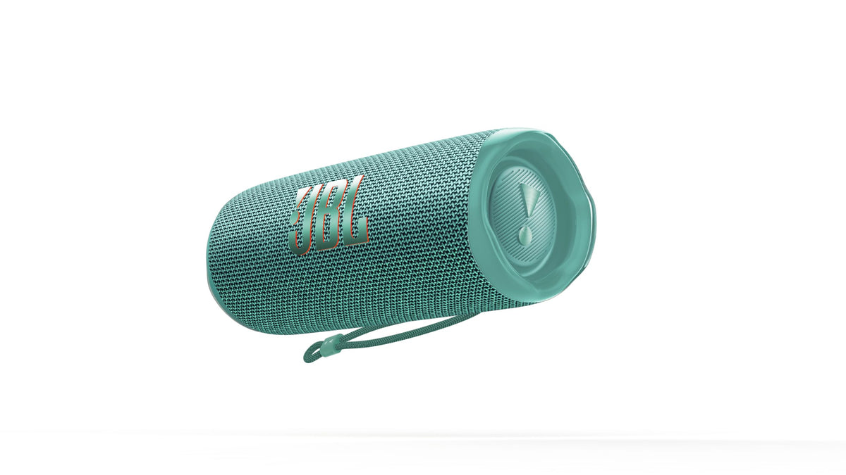 JBL Flip 6 Teal front view shows portable design for travel and outdoor listening