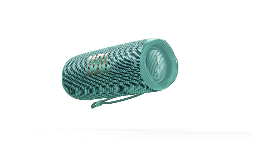 JBL Flip 6 Teal front view shows portable design for travel and outdoor listening