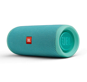 JBL Flip 5 teal poolside use demonstrates splash-safe outdoor listening.