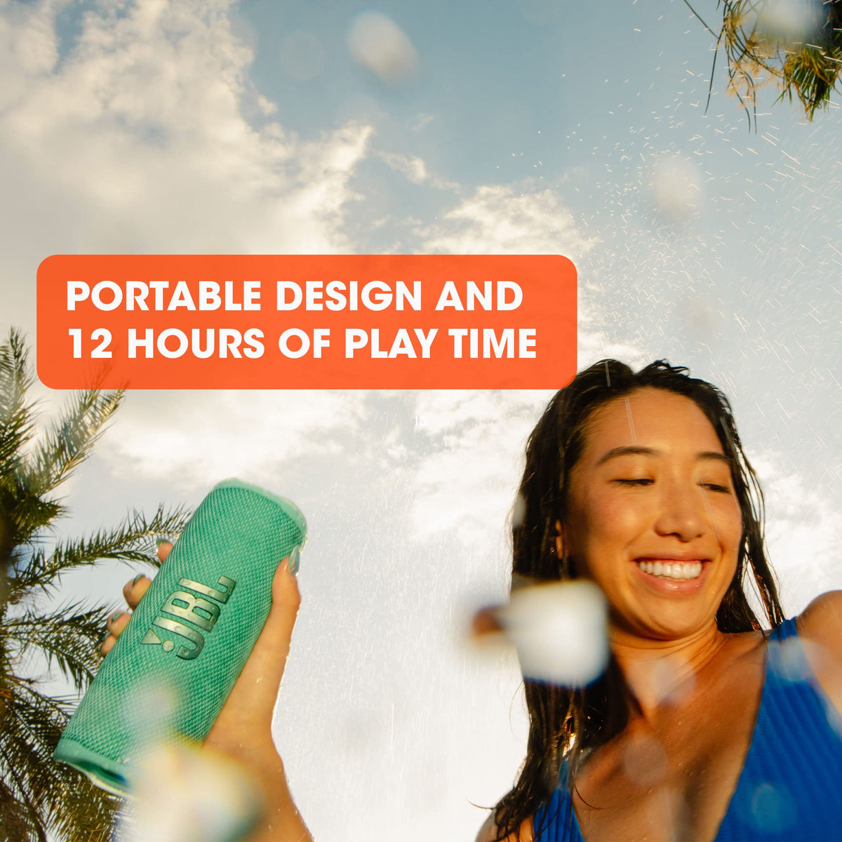 JBL Flip 6 blue top controls for easy playback and volume.