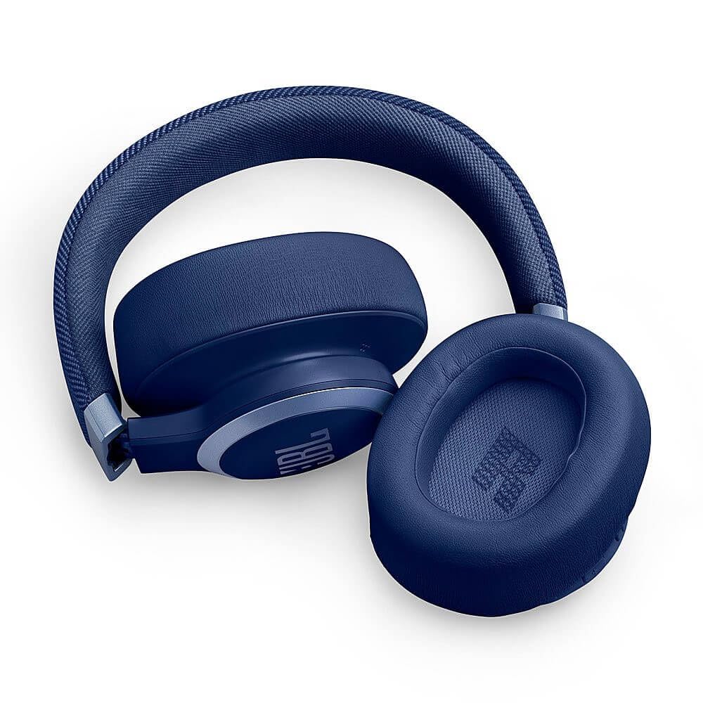JBL Live 770NC in hand for size scale, helping visualize portable size