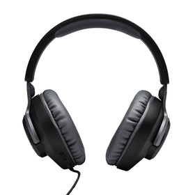 JBL Quantum 100 on gamer playing competitive title illustrating immersive audio advantage