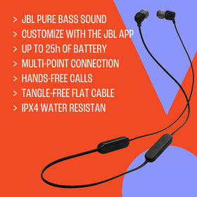 Person wearing JBL Tune 135BT while commuting for reliable on-the-go audio