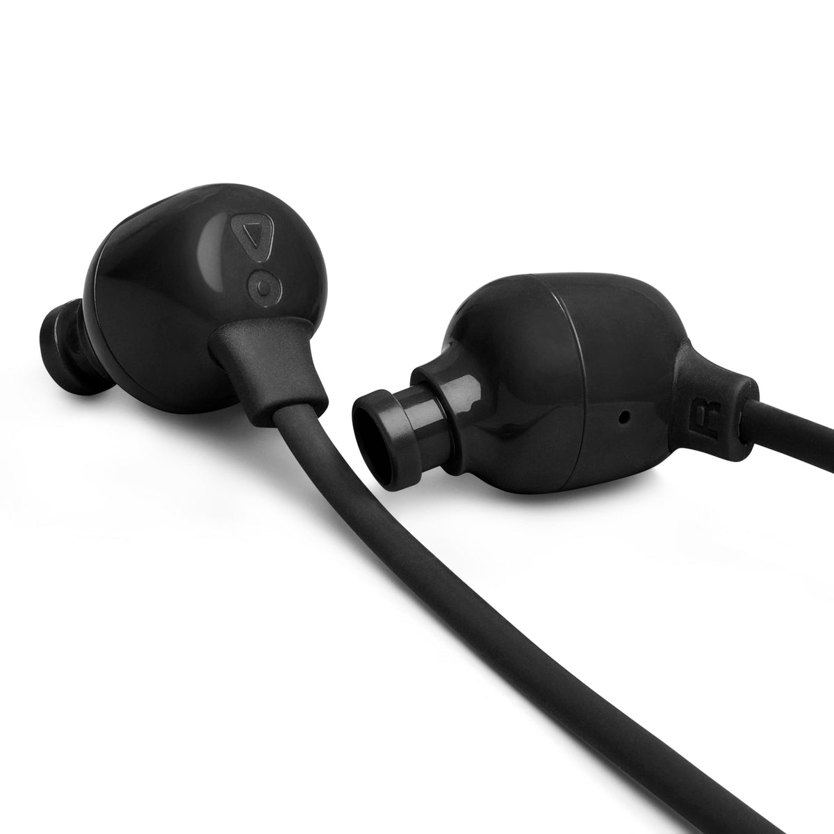 JBL Tune 135BT with water splashes showing IPX4 resistance for outdoor use