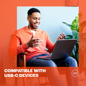 JBL Tune 310C held in hand to show compact portable size and everyday carry