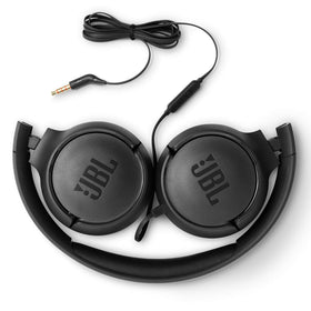 JBL Tune 500 worn on commuter showing comfortable fit and daily convenience