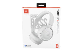 JBL Tune 510BT next to smartphone showing size and device compatibility