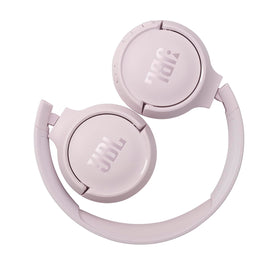 JBL Tune 510BT next to smartphone showing scale and Bluetooth convenience
