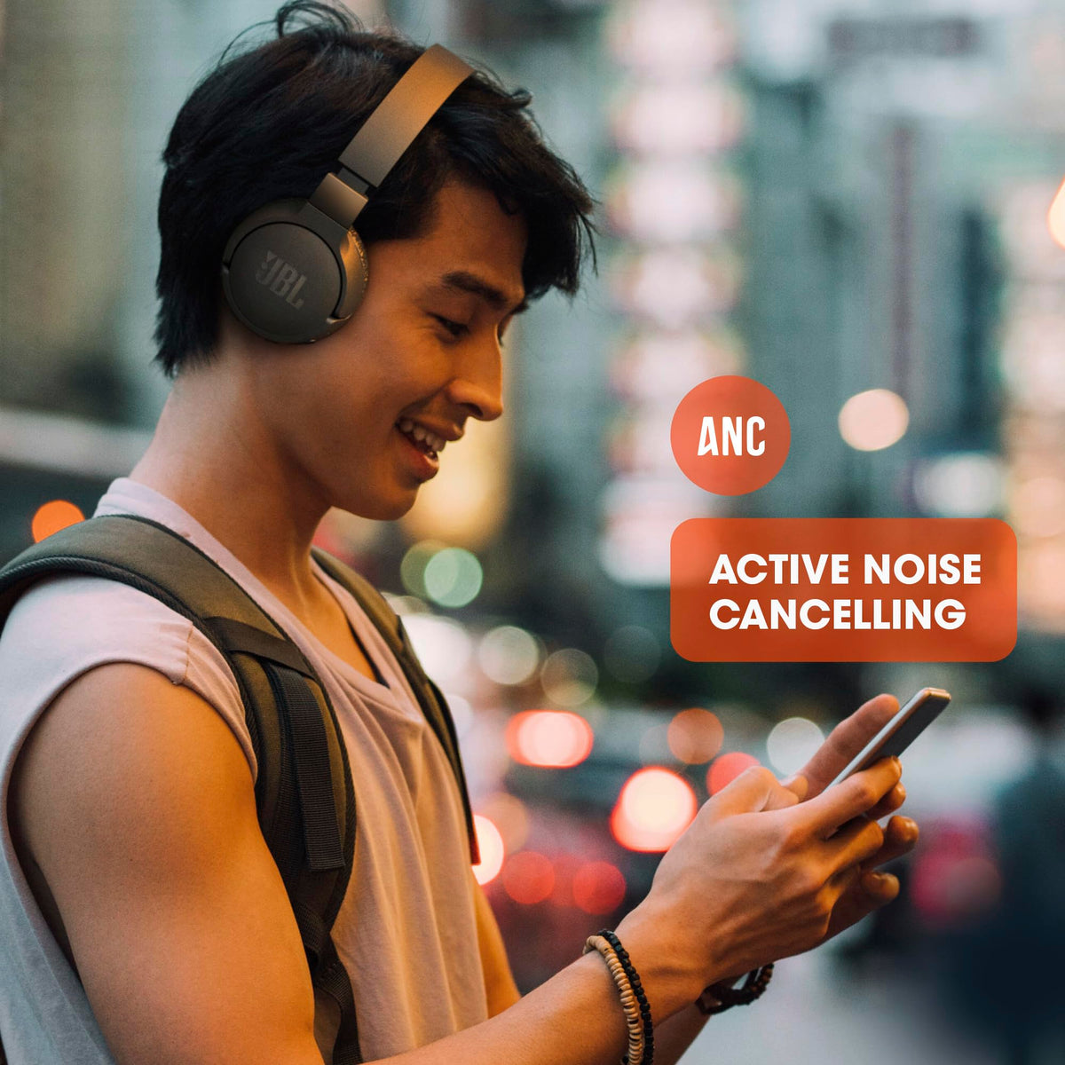 JBL Tune 660NC with USB-C and audio cable, illustrating included accessories