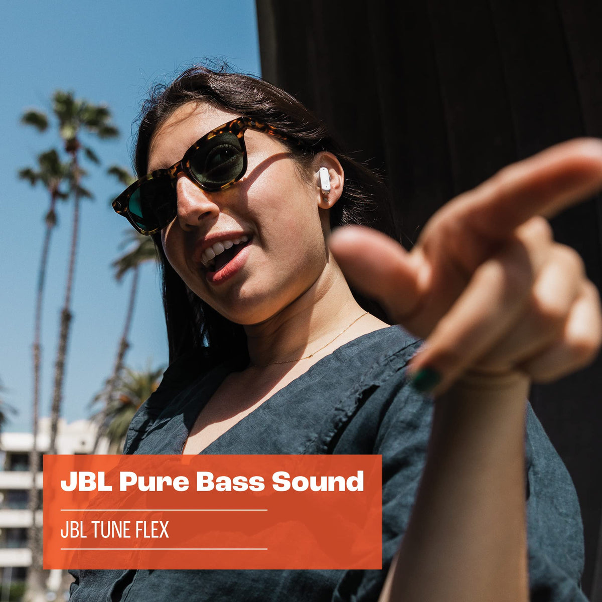 JBL Tune Flex earbuds in case open, easy to grab on the go.