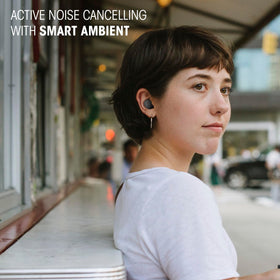 Hand holding JBL Vibe Buds 2 to show scale, emphasizing pocketable convenience