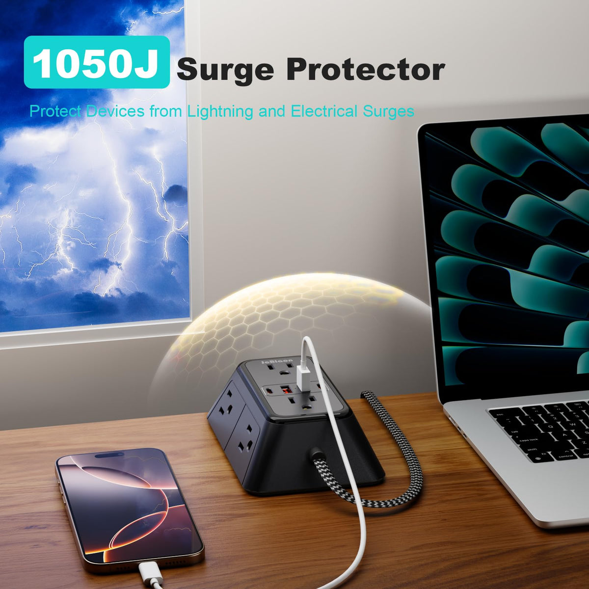 JcBlaon surge protector in use on a desk keeps cables organized.