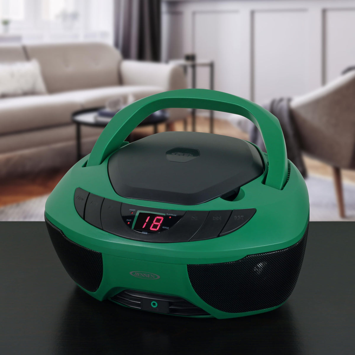 Jensen top-loading CD closeup highlighting disc slot and compatibility for quick playback
