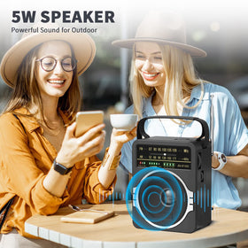 JEUJUG radio on a picnic blanket showing portability and outdoor entertainment benefit
