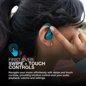 JLab JBuds Sport ANC4 teal earbuds worn during a workout.