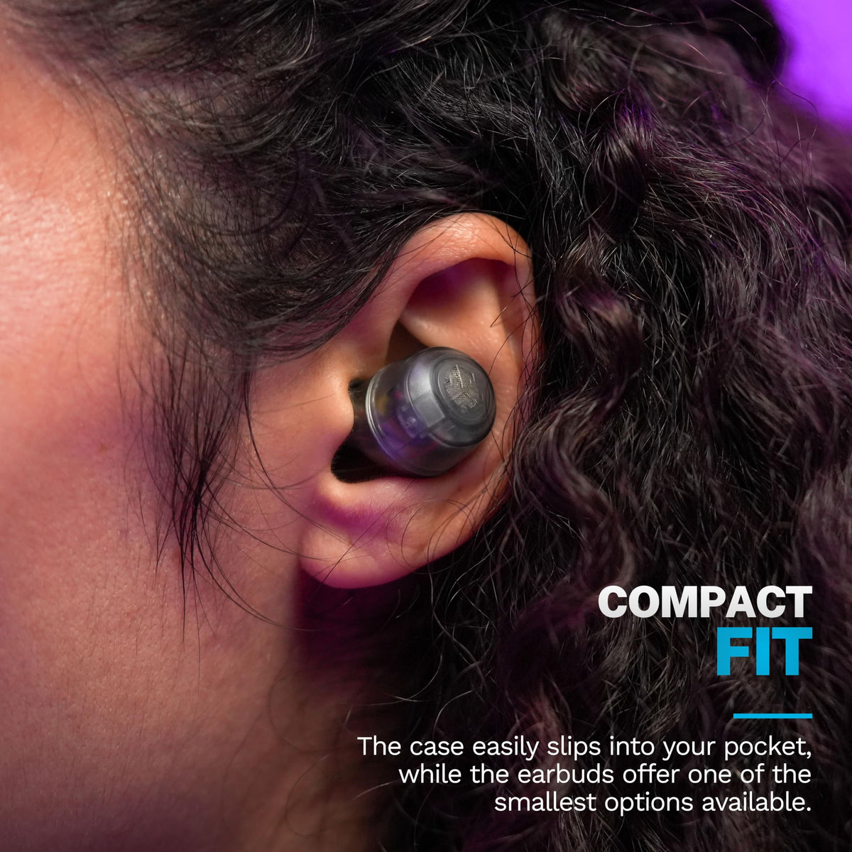 JLab Go Air Pop+ beside a coin to show compact portable size